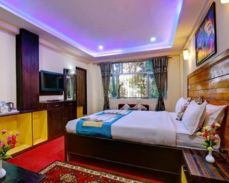 Hotel Golden Dolma - דאריילינג - חדר שינה