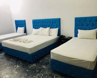 Hotel Rose Inn Lahore - Lahore - Slaapkamer