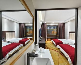 Hua Sheng Business Hotel - جيوتشيوان - غرفة نوم