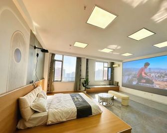 Qichi Cloud Bath Cinema Resort Apartment (Tianci Future City Branch) - Dandong - Schlafzimmer