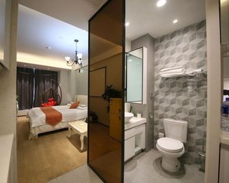 Berlin Boutique Hotel Apartment (Nanjing Tianlong Temple Metro Station) - Nankín - Habitación