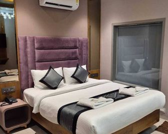 Hotel Regalia Suites - Navi Mumbai - Ložnice