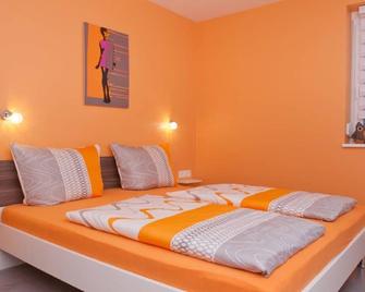 Vacation apartment 6, 58sqm, 2 bedrooms, max. 6 persons - Rust - Bedroom