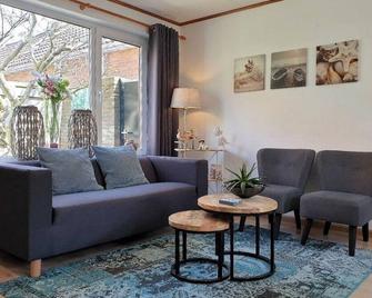 Holiday home 'Windhoos' with private garden and terrace - Egmond aan Zee - Wohnzimmer