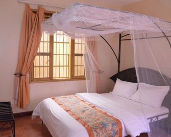 Two Seasons Hotel - Mbale - Habitación