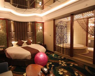 Four Seasons Guanghua Hotel - Jiaxing - Bedroom
