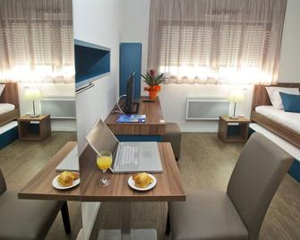 Appart Hotel Odalys City Tours Le Jardin des Lettres - טור - חדר שינה