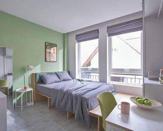 إم مفيليدج ليفينج كو لونج - هوتشي مين سيتي - غرفة نوم