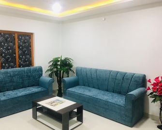 Drizzle Days - Port Blair - Huiskamer