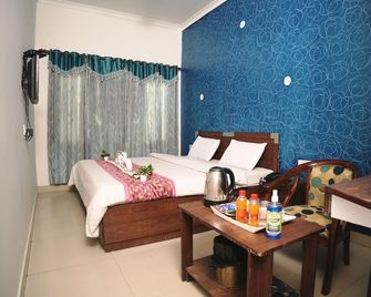 Hotel Holiday Comfort - 800 mts from Jallianwala Bagh, Amritsar - אמריצר - חדר שינה