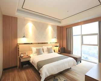 Greentree Eastern Bengbu City Guzhen County Century Hotel - Bengbu - Schlafzimmer