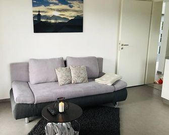 Vacation apartment Vivien - Holiday apartment - Rieden am Forggensee - Living room