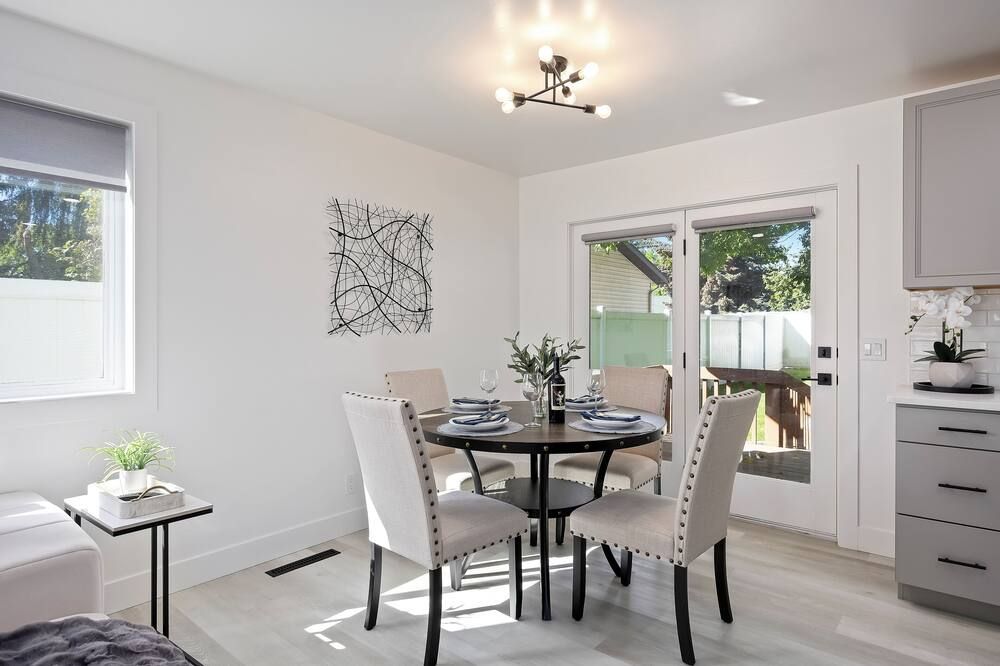 Sleek modern design meets peaceful retreat for a comfortable stay. - Burley - Dining room