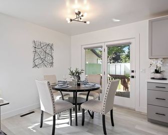 Sleek modern design meets peaceful retreat for a comfortable stay. - Burley - Dining room