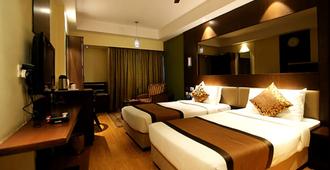 Hotel Daspalla - ויסאקאפאטנם - חדר שינה