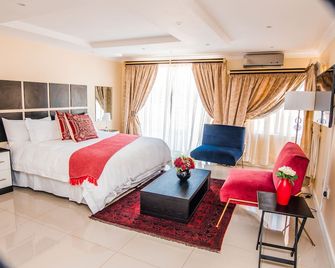 Royal Hills Lodge and Spa - 토호얀도우 - 침실