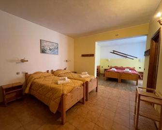 Hotel Genzianella - Santa Caterina Valfurva - Camera da letto