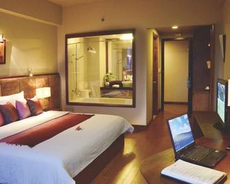 Asia Hotel Hue - Huế - Schlafzimmer