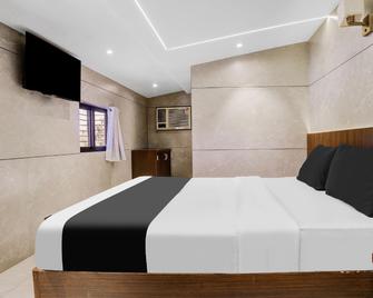Hotel O Woodland - Mumbai - Quarto