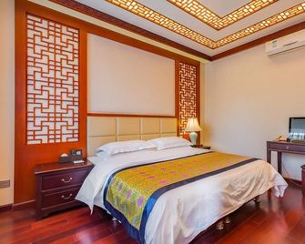 The Qomolangma Hotel - Beijing - Bedroom