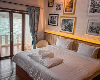 Morelo Water Villa - באטאם קוטה - חדר שינה