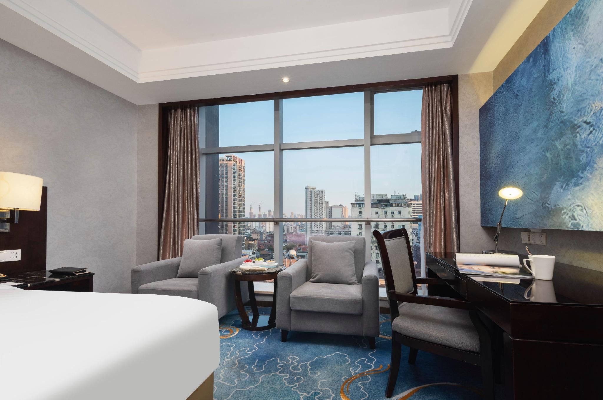 ووهان هويهاو هوتل - وهان - غرفة نوم