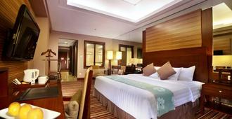 Aston Samarinda Hotel And Convention Center - Samarinda - Bedroom