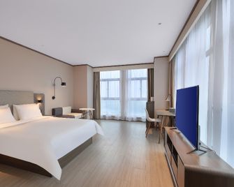 Hanting Hotel Anqing Wuyue Plaza - Anqing - Chambre