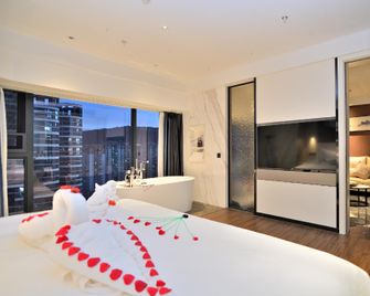 Kunming Haoyue Hotel- Gaoxin Wuyue Plaza Branch - Kunming - Bedroom