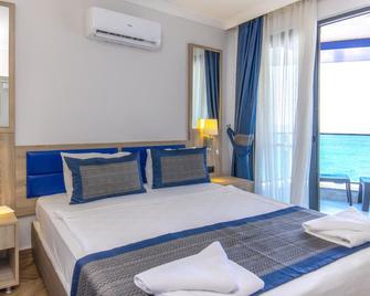 Relax Beach Hotel - אלניה - חדר שינה