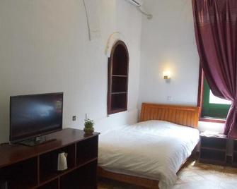 Jinan Mountain and Sea Culture Hotel - Jinan - Bedroom