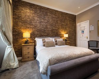 Howbeck Guest House - ווינדרמר - חדר שינה