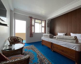 Hotel Long Island - Darjeeling - Camera da letto