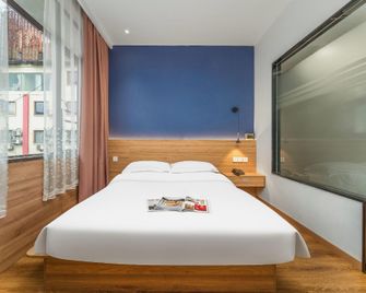 Wangcheng Boutique Hotel (Guilin Liangjiang Sihu Dongxi Alley Shop) - גילין - חדר שינה
