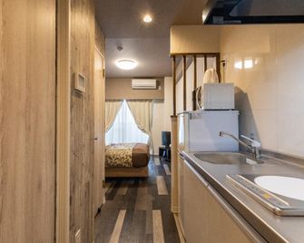 Mr. Kinjo In Mihara - Naha - Slaapkamer
