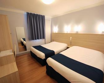 Hôtel De La Cathédrale - ריימס - חדר שינה