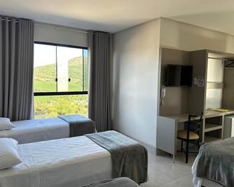 Escarpas resort - קאפיטוליו - חדר שינה