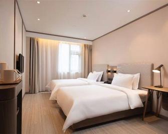 Hanting Hotel Lianyungang Jiefang East Road - Lianyungang - Bedroom