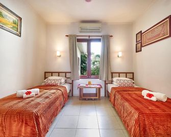 Al-Isha Dharamshala - Kuta - Phòng ngủ