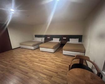 Iris House Hotel - Brinchang - Soveværelse