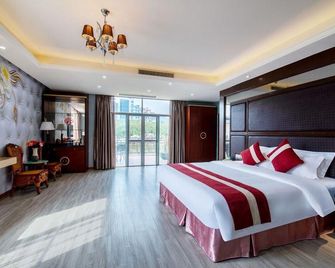 Longhu Island Hotel (Deqing Longmu Street) - Zhaoqing - Спальня