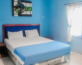 RedDoorz near Pantai Citepus Pelabuhan Ratu - Sukabumi - Bedroom
