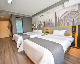 Thank Hotel Shandong Rizhao Donggang District Huanghai Yi Road Railway Station - Rizhao - Ložnice