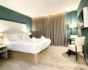 Axiom Park Hotel - לונדון - חדר שינה