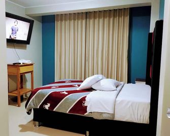 Hostal Toscano Suites - Huancayo - Schlafzimmer