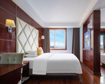 Enjoy Jinyu Lido Chess & Tea Business Hotel (Nanchong Railway Station Branch) - Nanchong - Bedroom