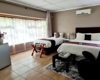 Thamalakane guest house - Maun - Makuuhuone