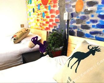 Yuanzu International Youth Hostel - Weihai - Yatak Odası