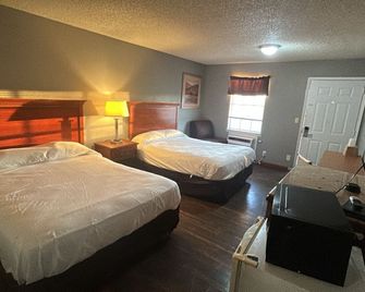 Hiway Inn Express Elk City Route 66 - Elk City - Bedroom