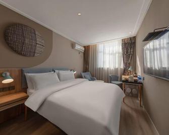 Home Inn (Zhenjiang Zhongshan Bridge Rt-Mart) - Zhenjiang - Habitación